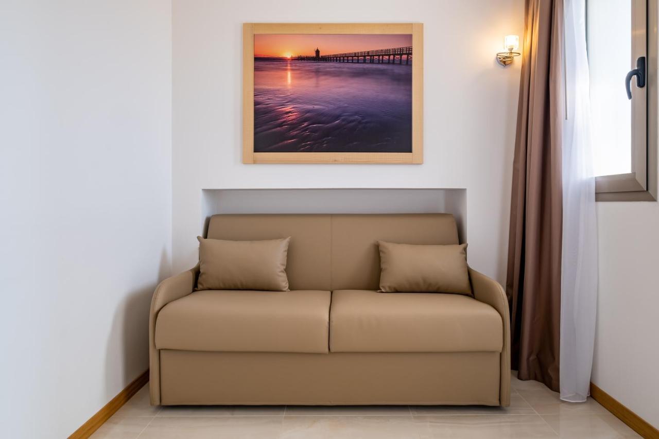 Hotel Mare Lignano Sabbiadoro Bagian luar foto