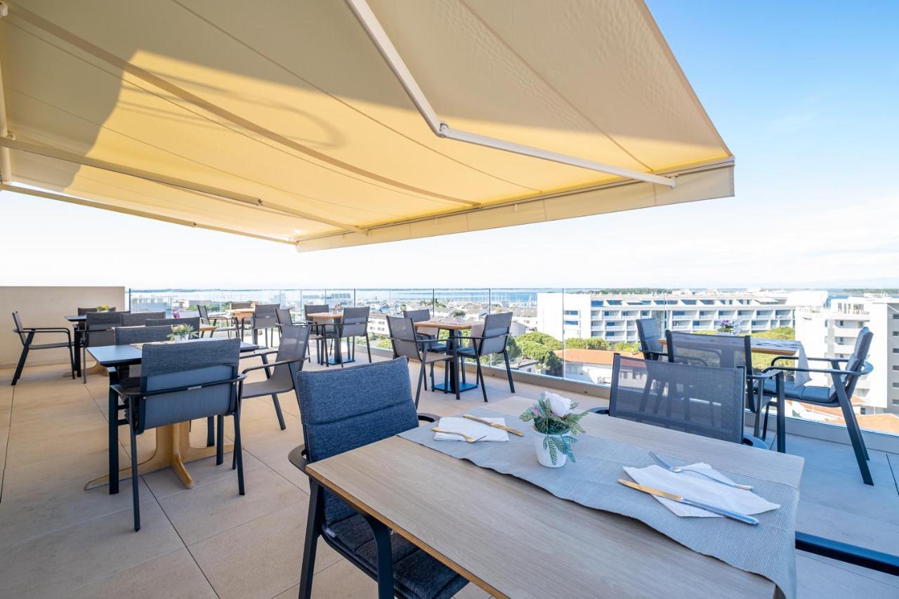 Hotel Mare Lignano Sabbiadoro Bagian luar foto
